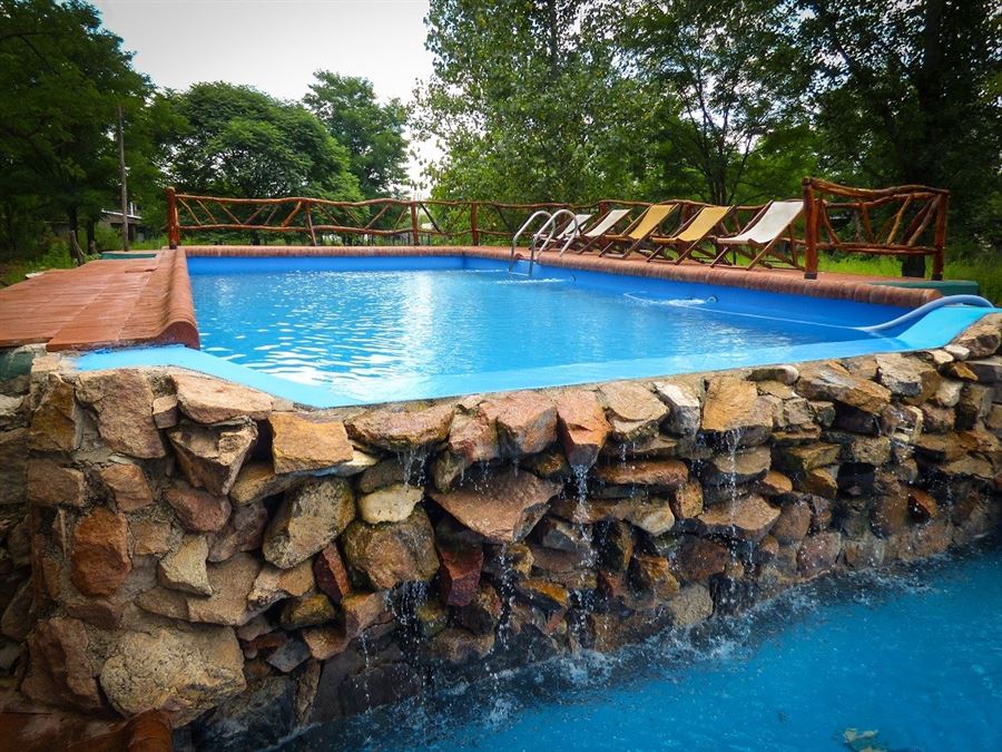 Pileta a modo de cascada serrana! | Menta y Peperina Granja Familiar y Casas de Campo - Mina Clavero - Traslasierra Pileta a modo de cascada serrana! | Menta y Peperina Granja Familiar y Casas de Campo - Mina Clavero - Traslasierra